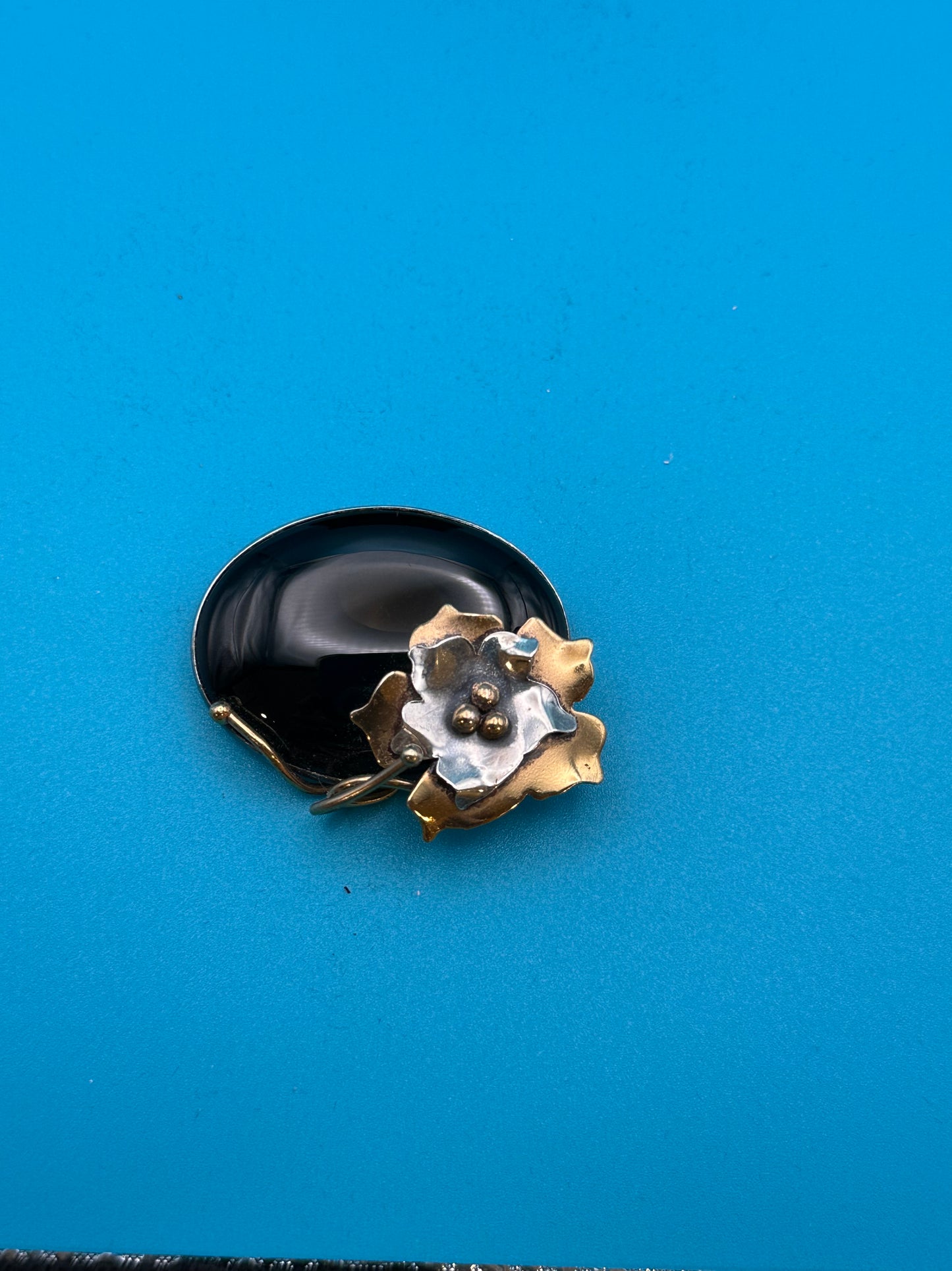 Vintage black stone brooch/pendant with, silver and bronze metal accents