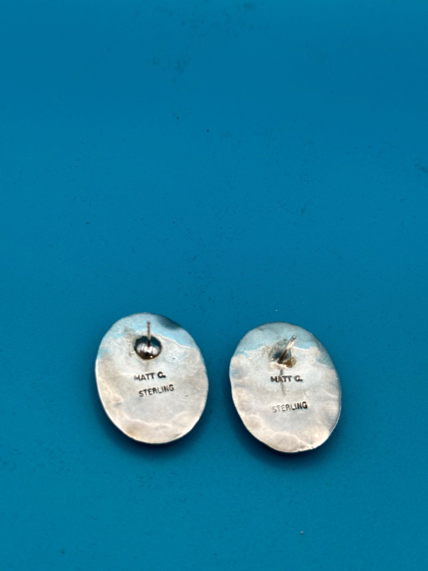Sterling silver and bezel set green gaspeite Native American earrings