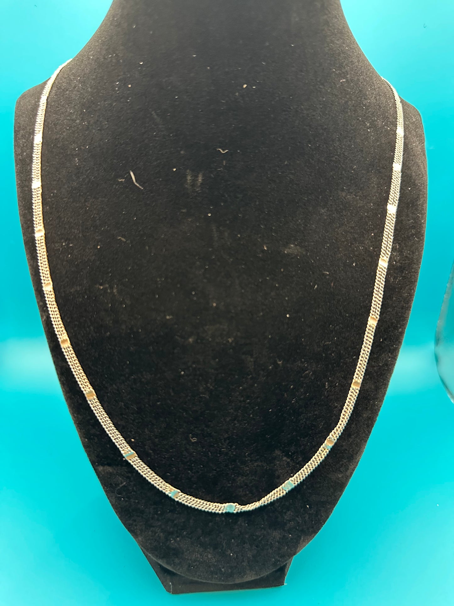 Attractive, light and airy fashion chain-link necklace. Three strands. It looks like sterling, but is unmarked.