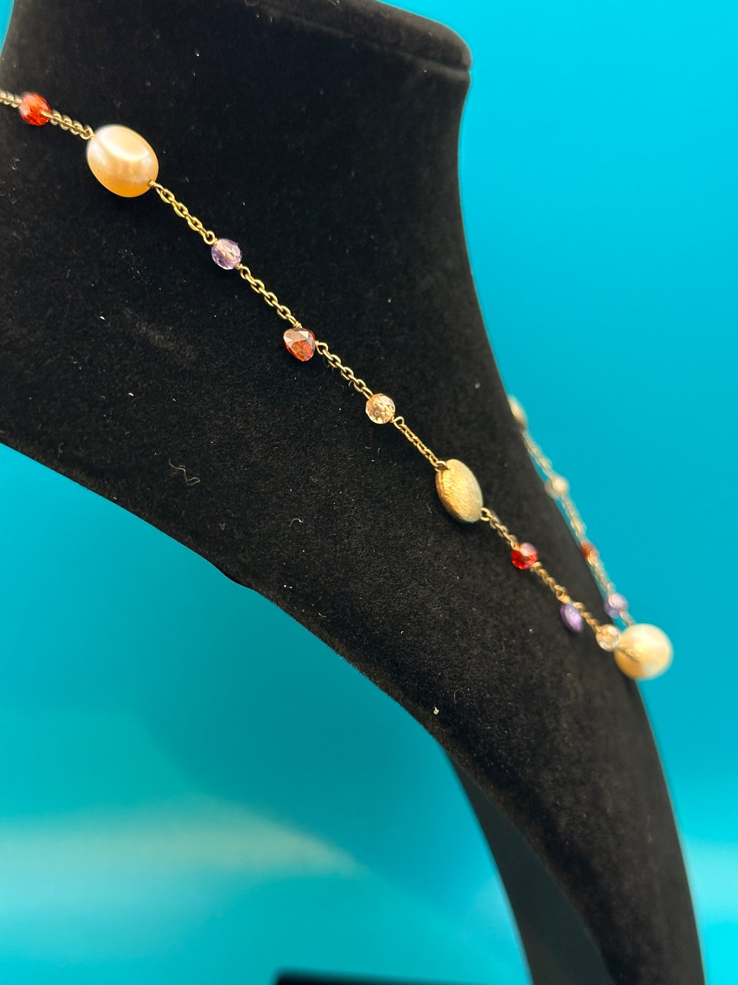 Simulated pearl, semi-precious stone, and gold Marco Bicego look-alike