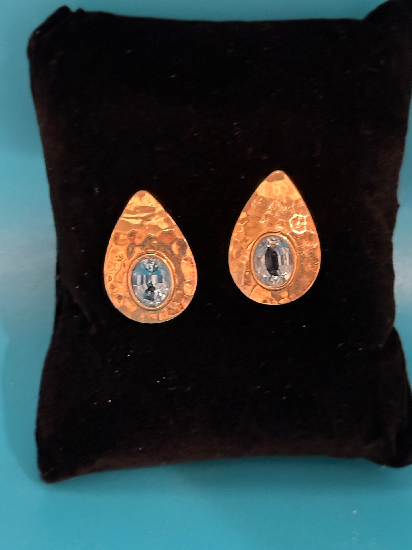 Contemporary hammered gold and blue topaz post earrings
