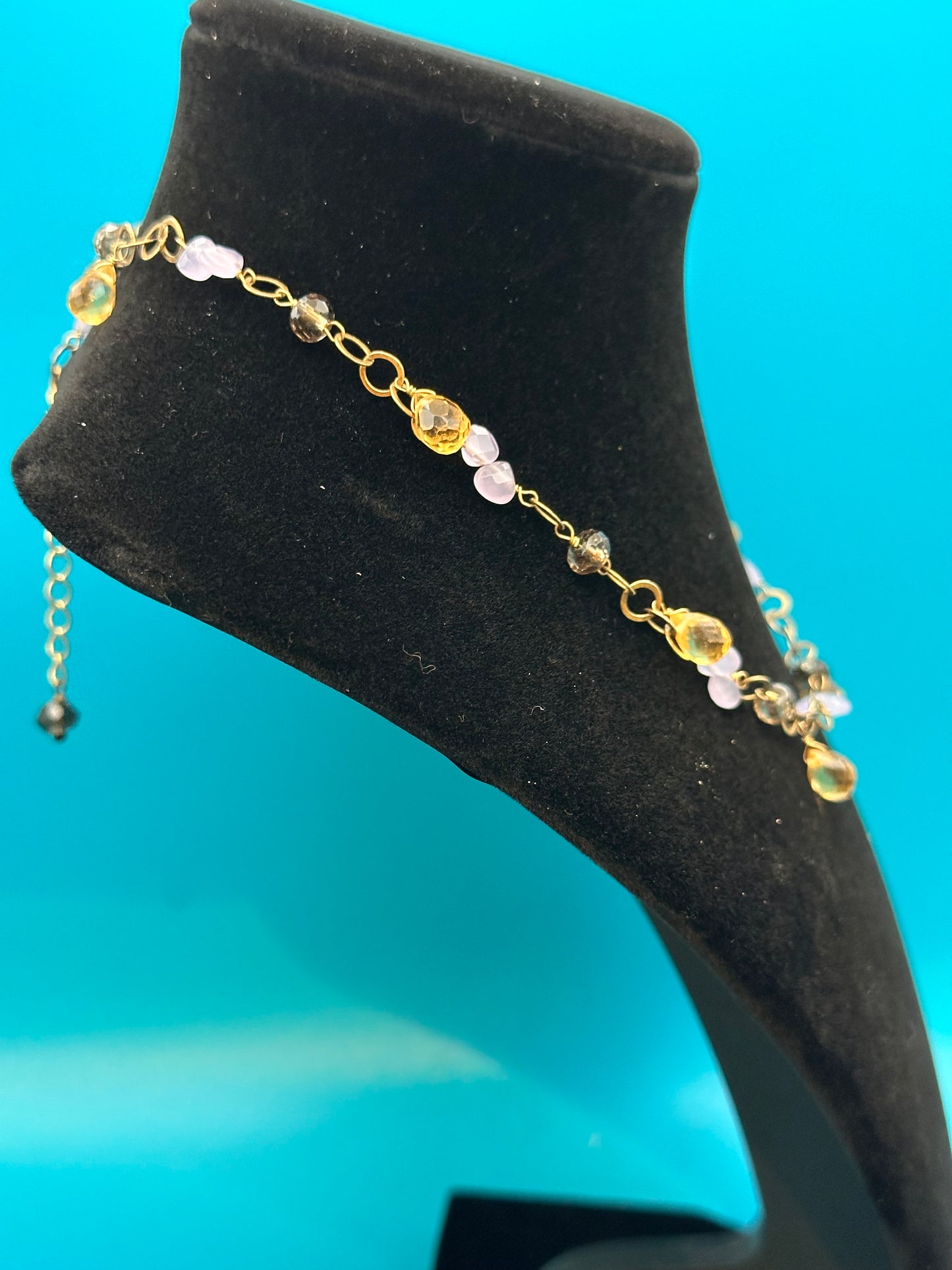 Simulated stone and gold necklace