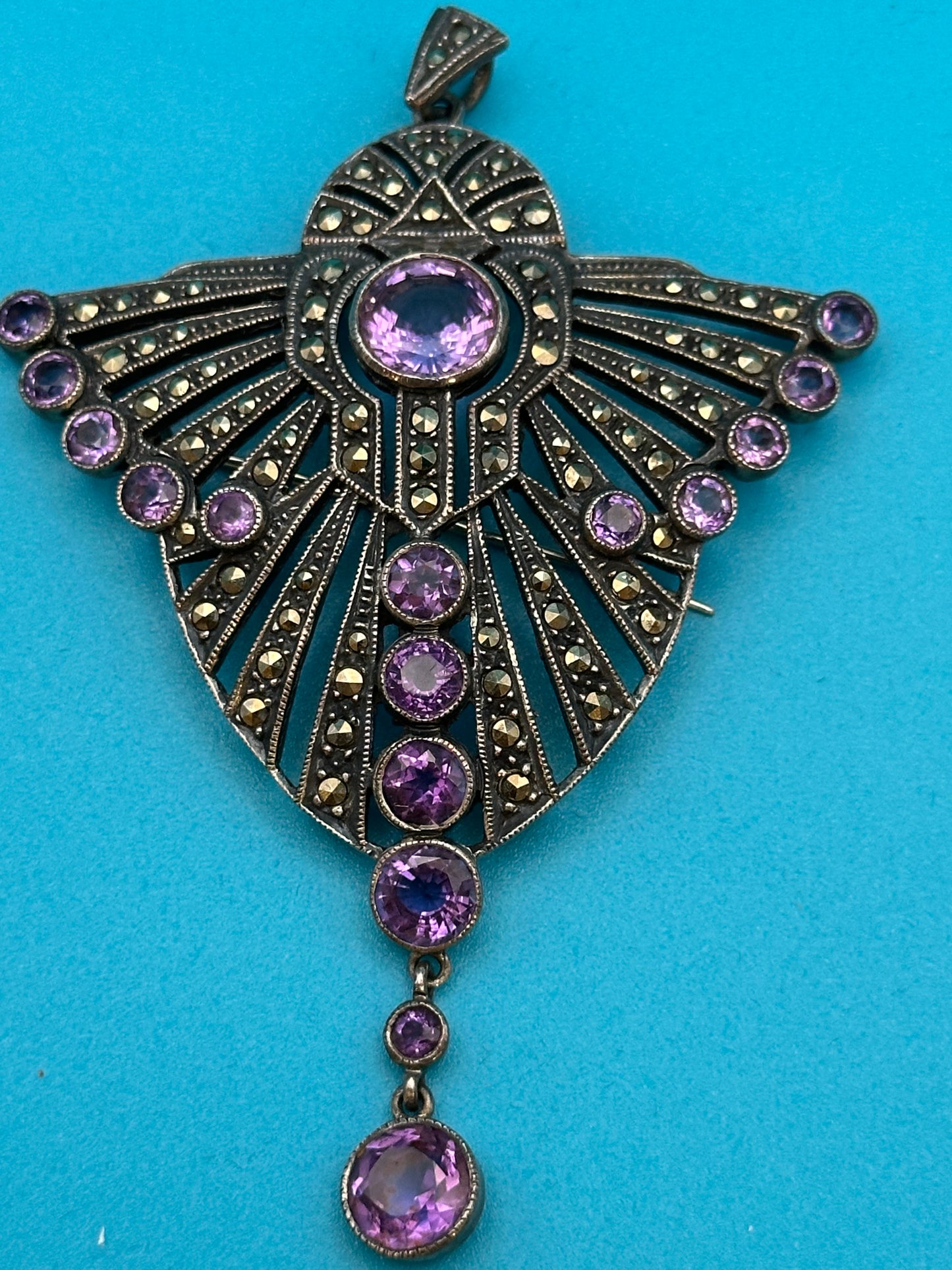 Vintage sterling silver, amethyst, and marcasite pendant/brooch.