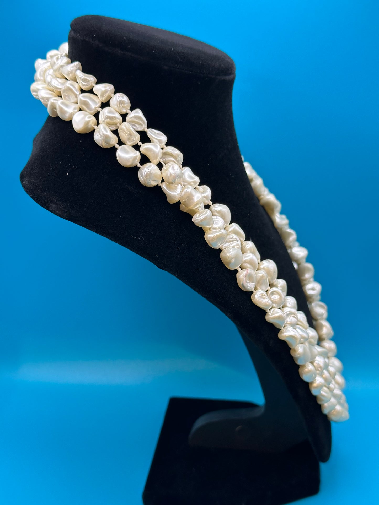Faux pearl necklace, can be worn in one long strand or wrapped up to three times.