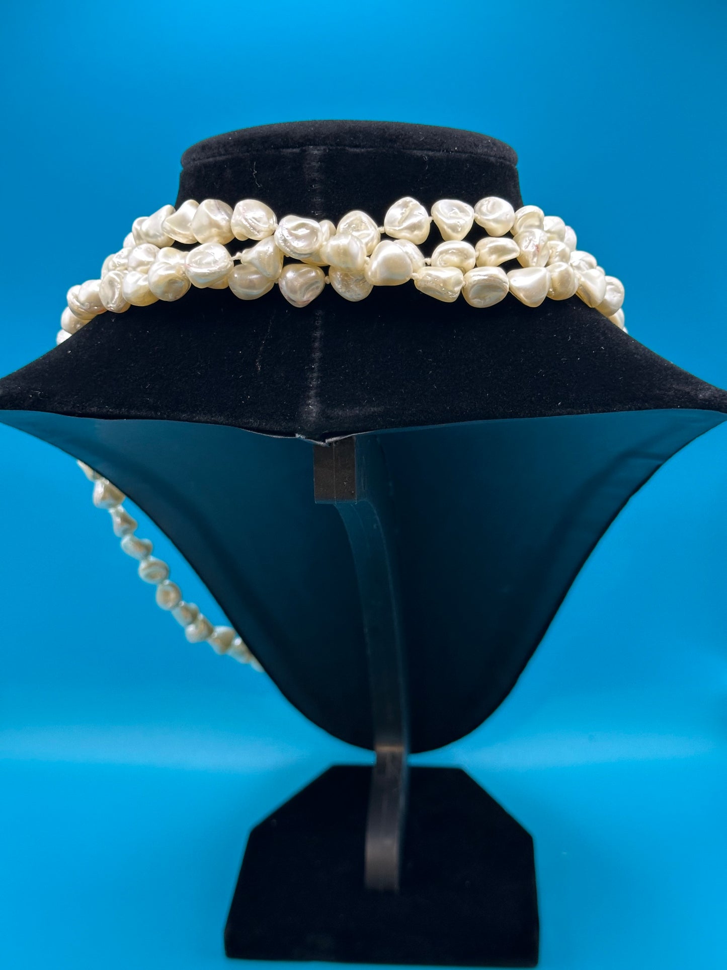 Faux pearl necklace, can be worn in one long strand or wrapped up to three times.
