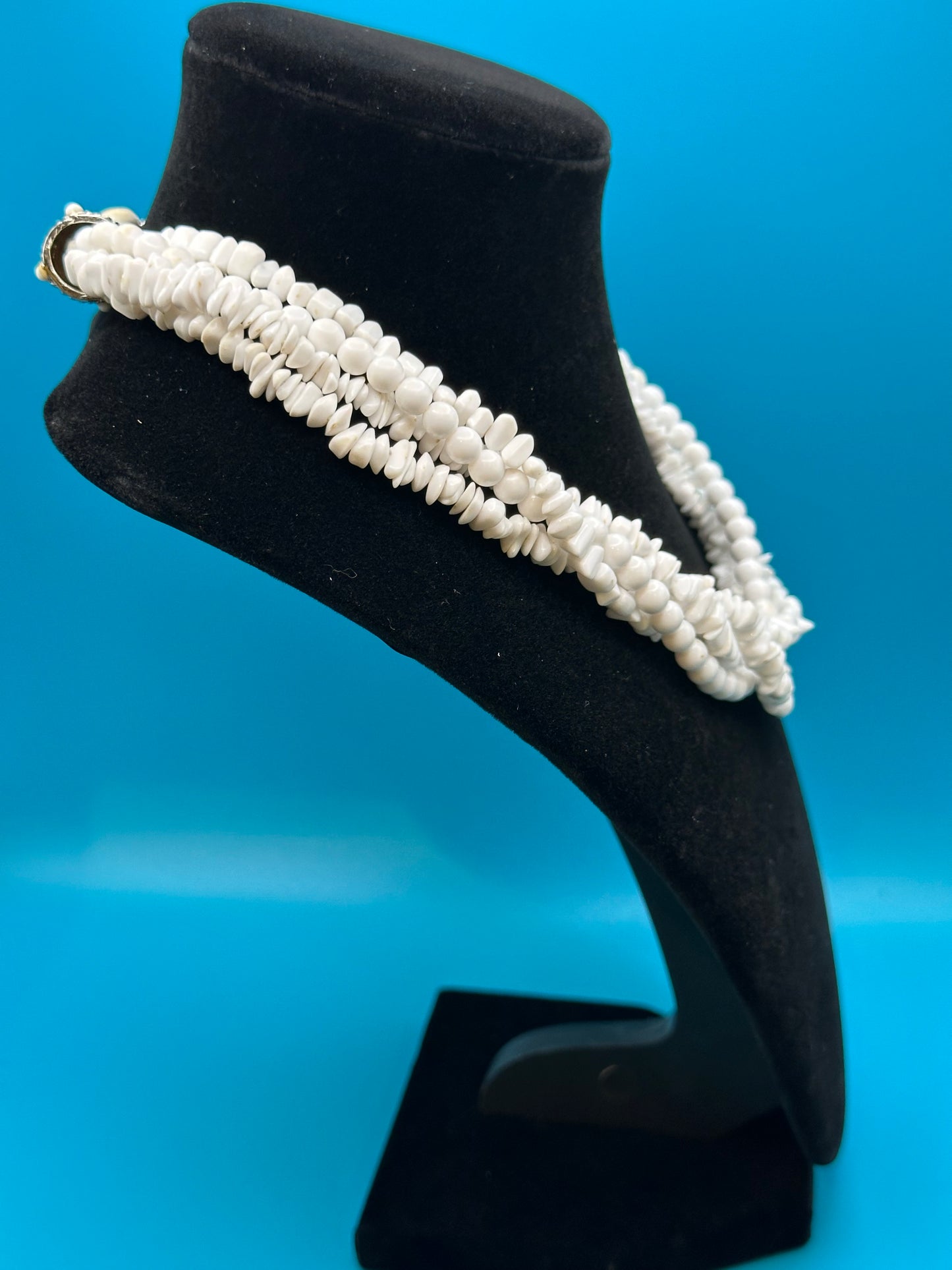 White plastic torsade necklace