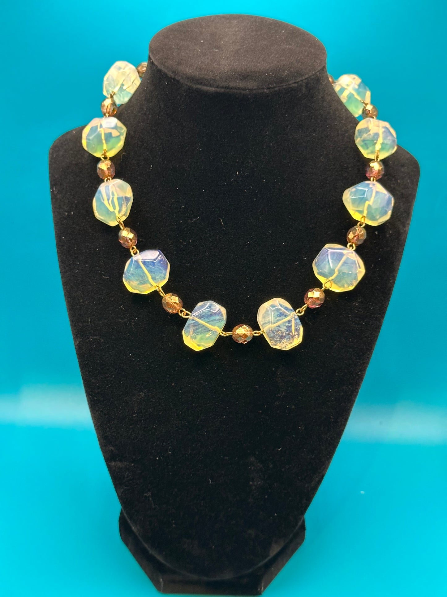 Amber resin and glass bead necklace