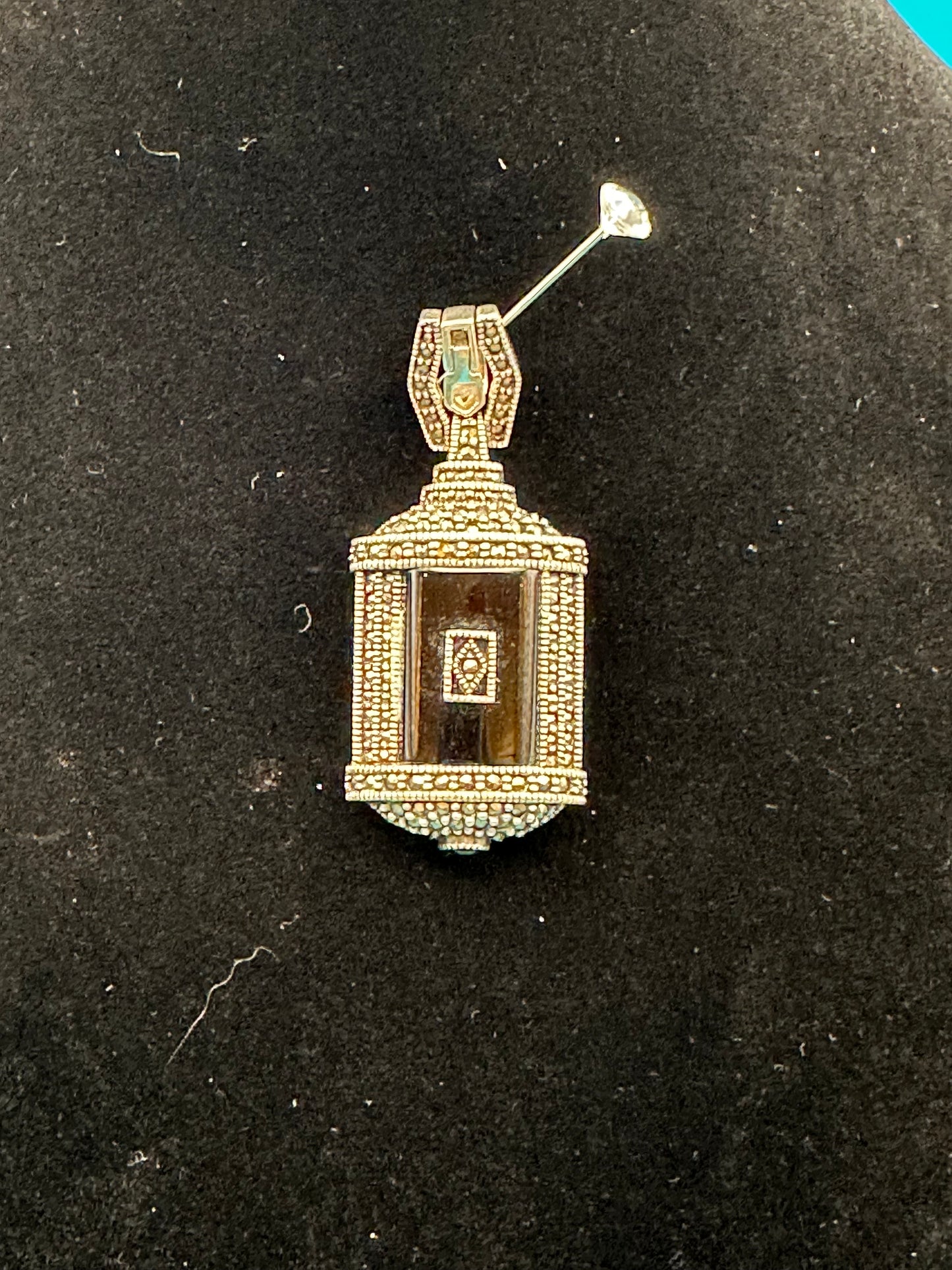 Sterling silver and onyx marcasite pendant
