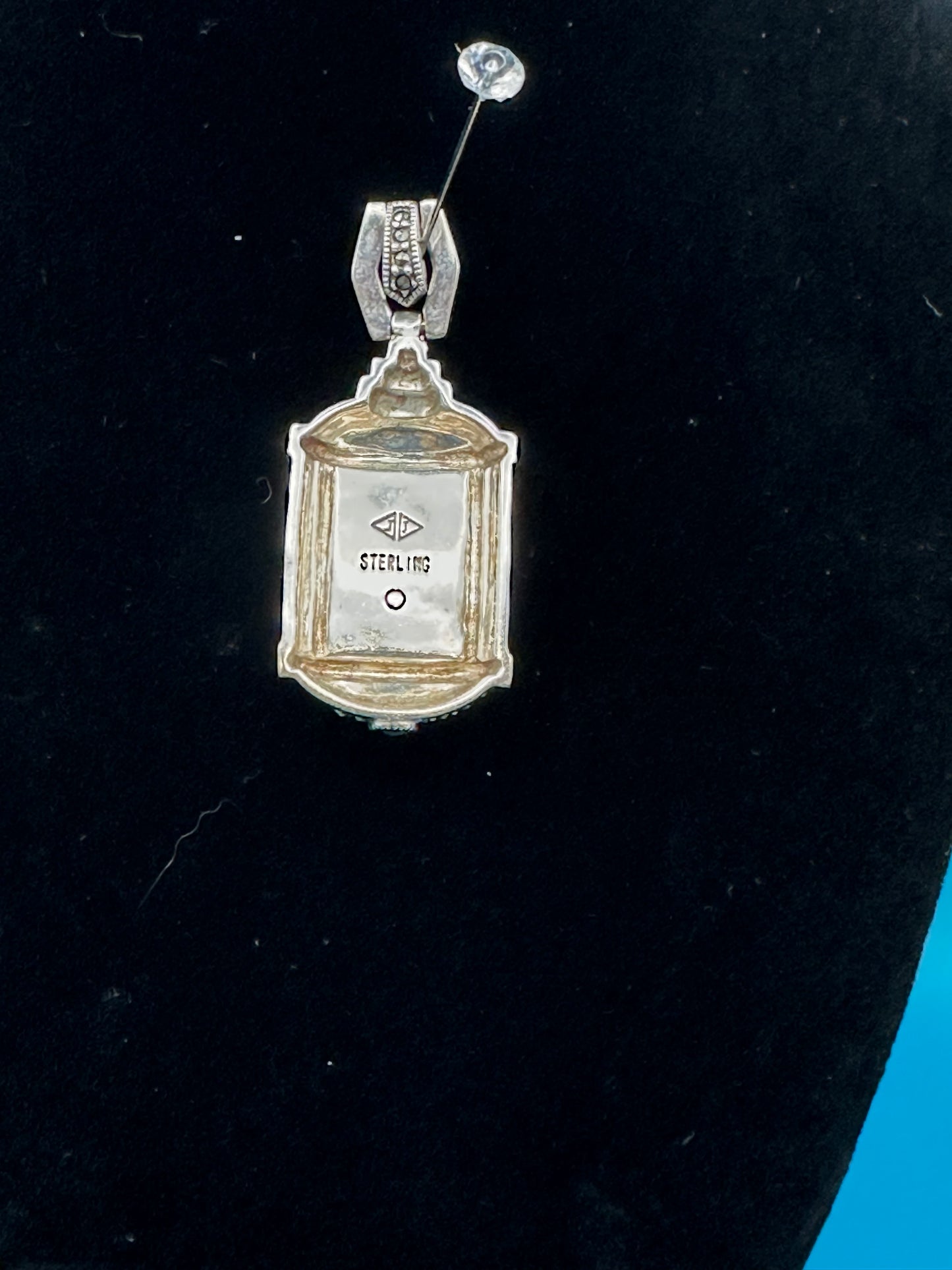 Sterling silver and onyx marcasite pendant