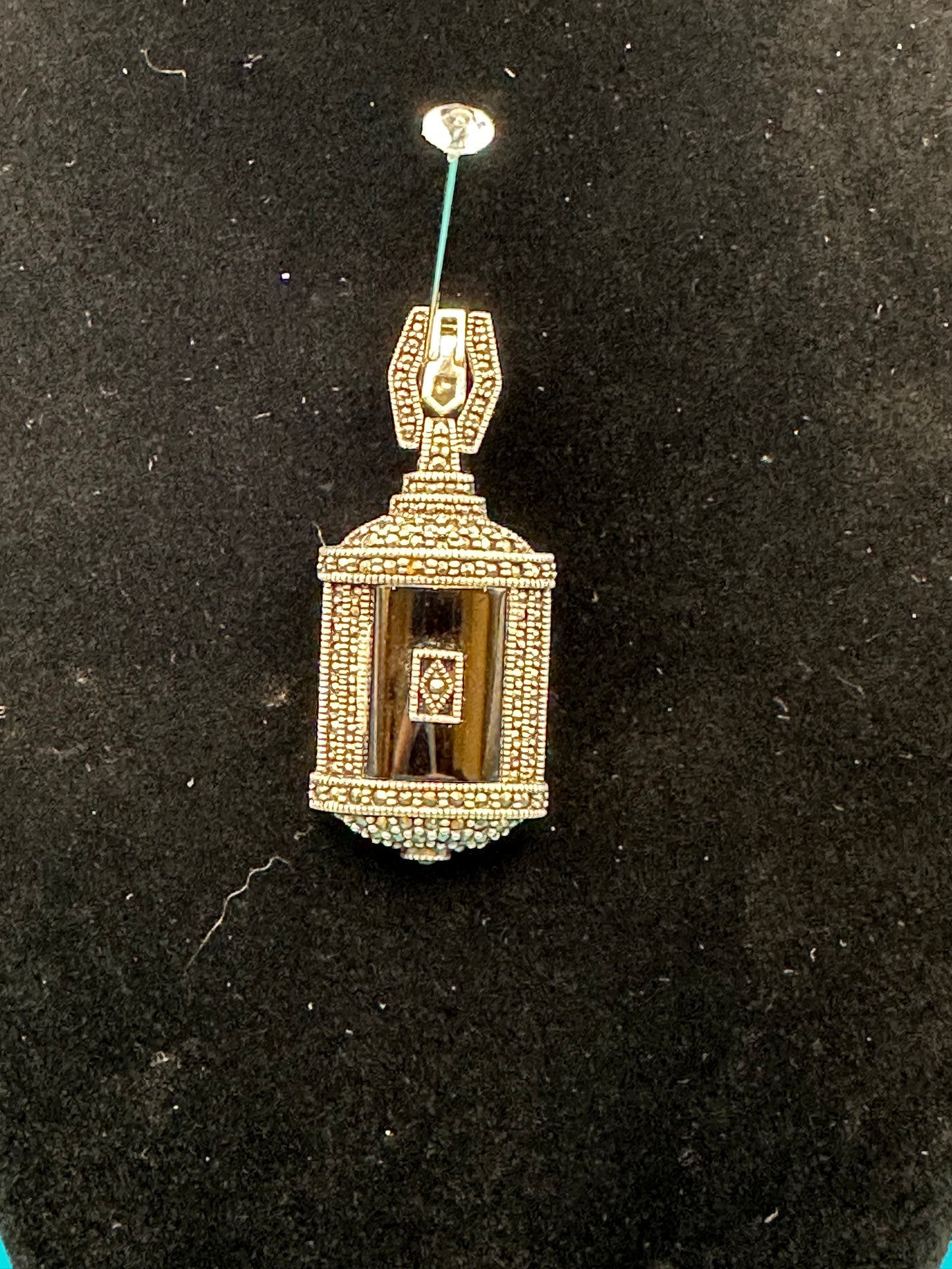 Sterling silver and onyx marcasite pendant