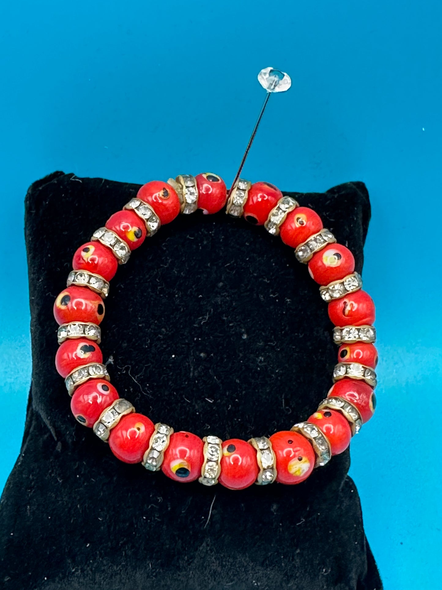 Red stone and rhinestone costume jewelry bracelet