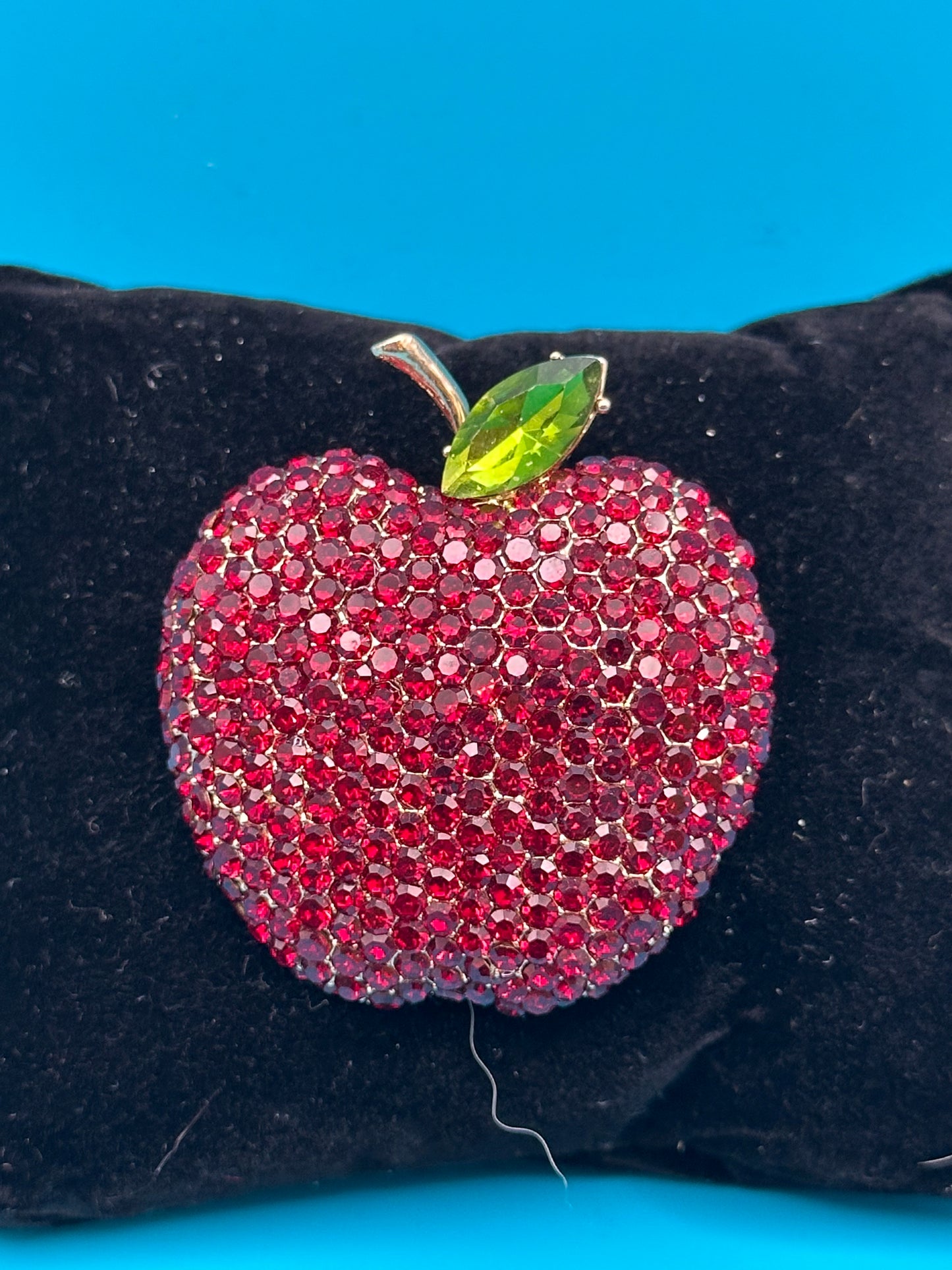 A lovely modern apple brooch