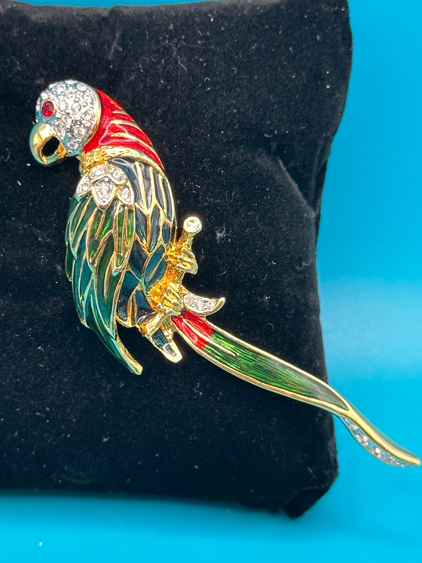 Gorgeous vibrant green, red, and gold enamel parrot brooch