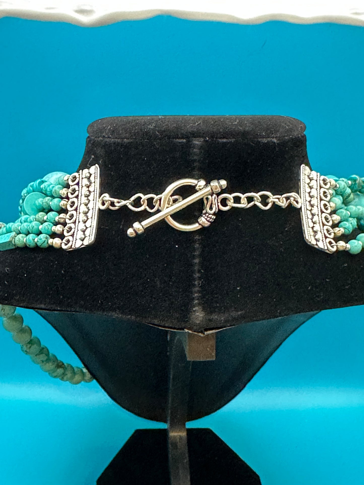 Turquoise and silver torsade necklace