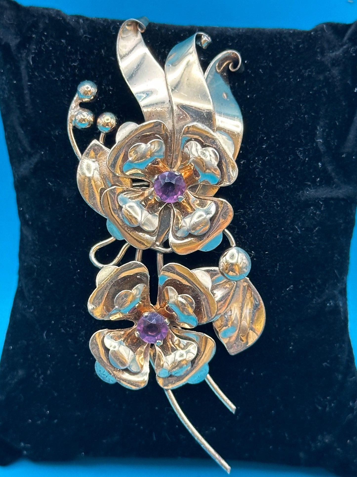 Harry Iskin vintage flower brooch with purple crystals