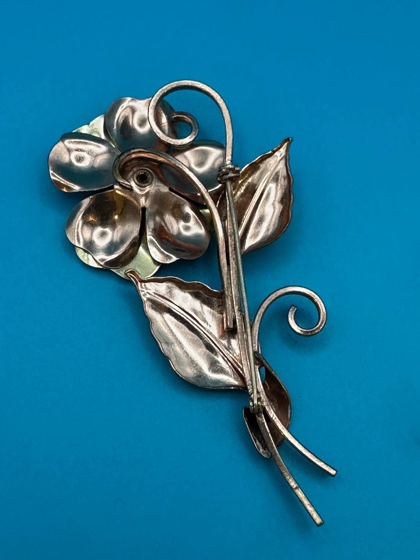 Vintage 1930's-1950's flower brooch with red crystal stone