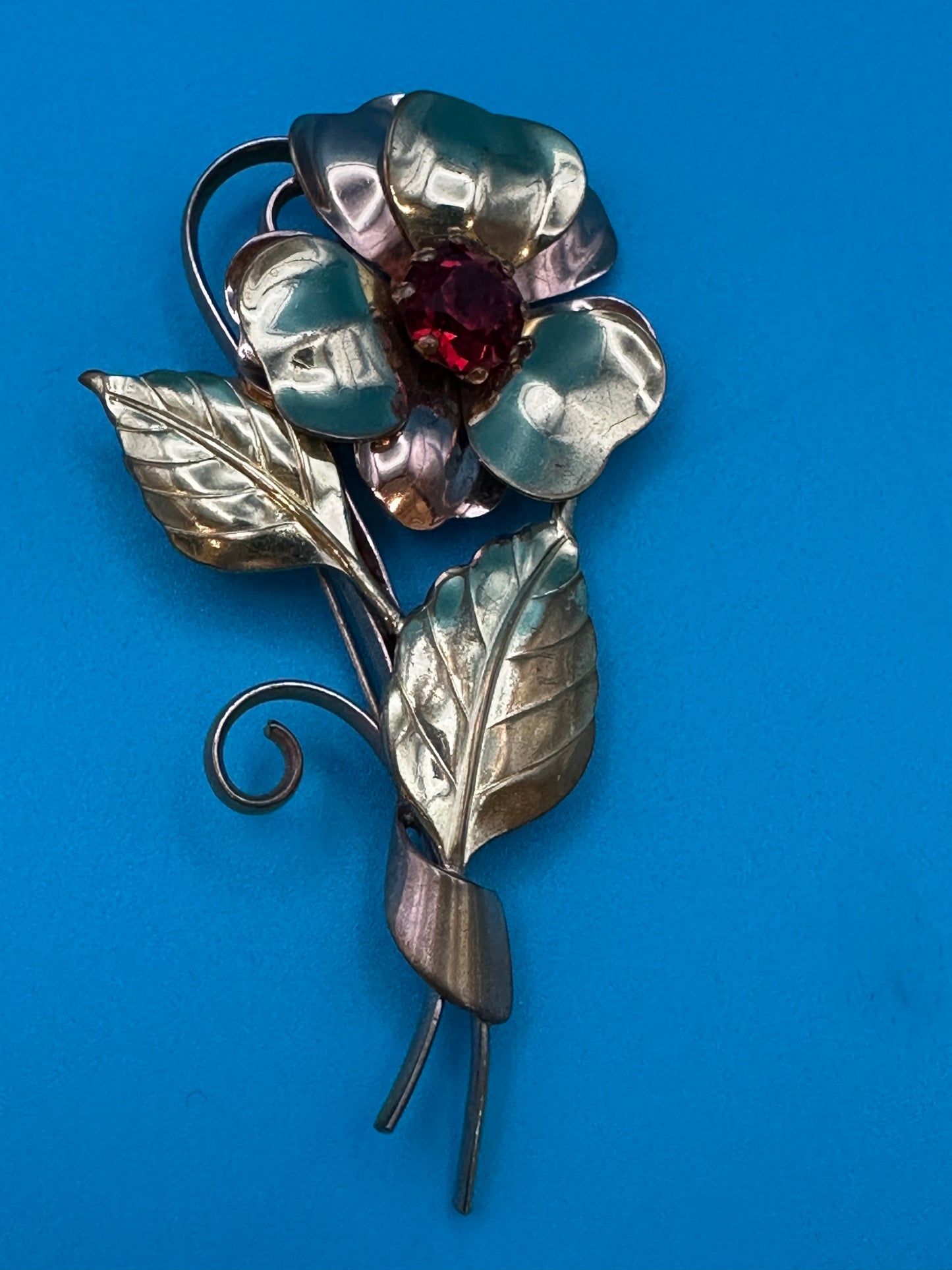 Vintage 1930's-1950's flower brooch with red crystal stone