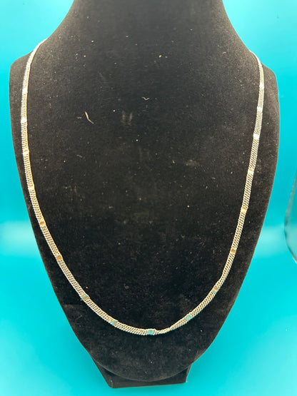 Attractive, light and airy fashion chain-link necklace. Three strands. It looks like sterling, but is unmarked.