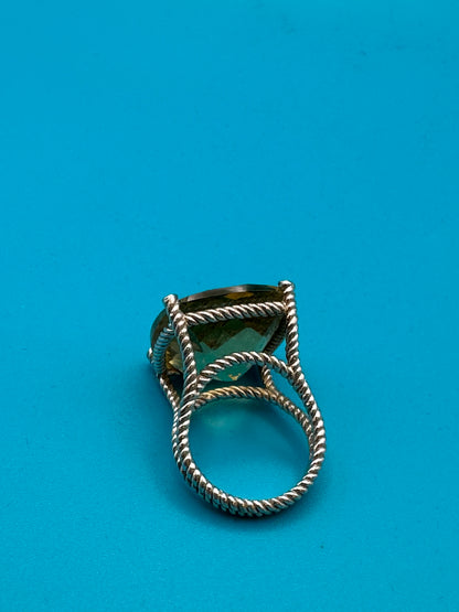 Lemon quartz cushion-cut stone in a sterling silver ring in rope setting