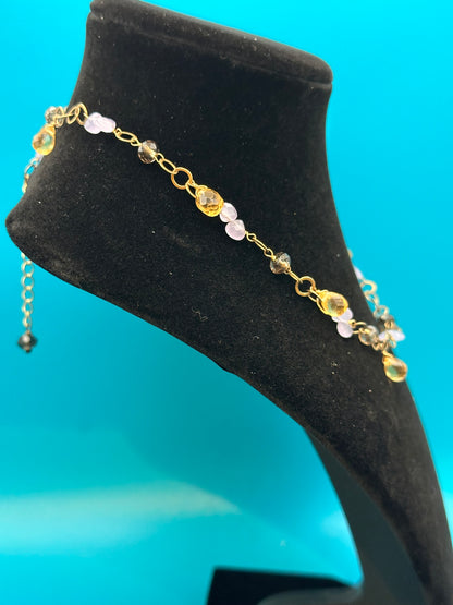 Simulated stone and gold necklace
