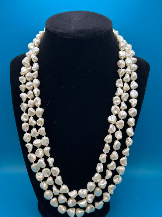 Faux pearl necklace, can be worn in one long strand or wrapped up to three times.