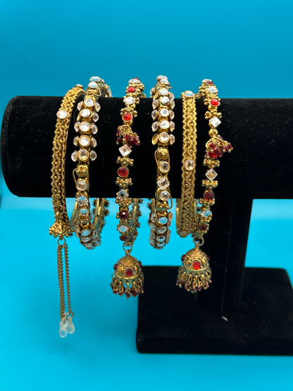 Six Indian bangle bracelets with a variety of stones and styles