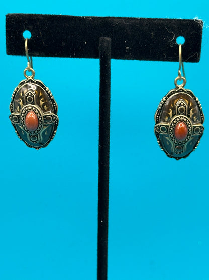 Carnelian-like stone and gold metal drop earrings on an ear wire