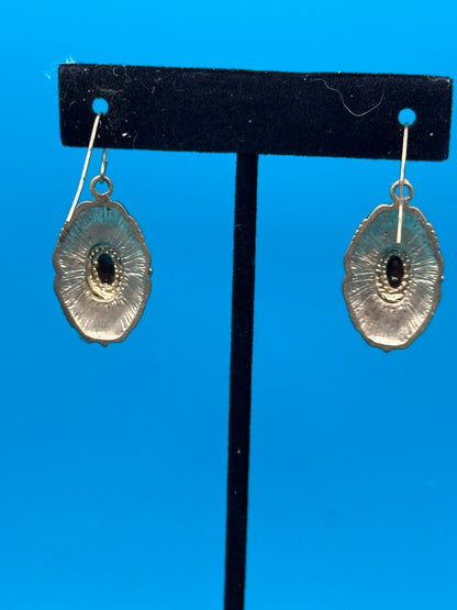 Carnelian-like stone and gold metal drop earrings on an ear wire