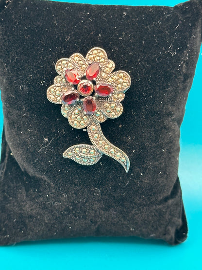 Vintage 925 sterling silver, marcasite, and garnet flower brooch
