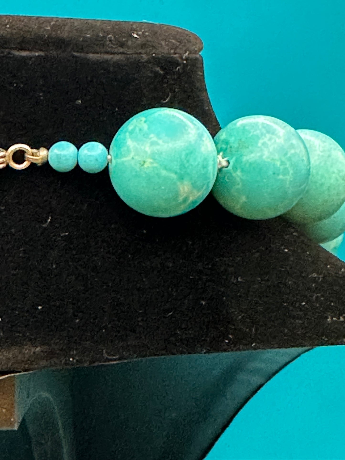 Vintage turquoise choker necklace. There are knots between each bead. Very large beads with silver metal clasp. Excellent condition
