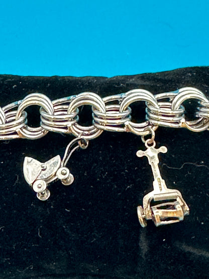 Sterling silver charm bracelet with sterling silver charms