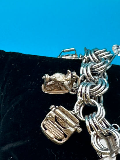 Sterling silver charm bracelet with sterling silver charms