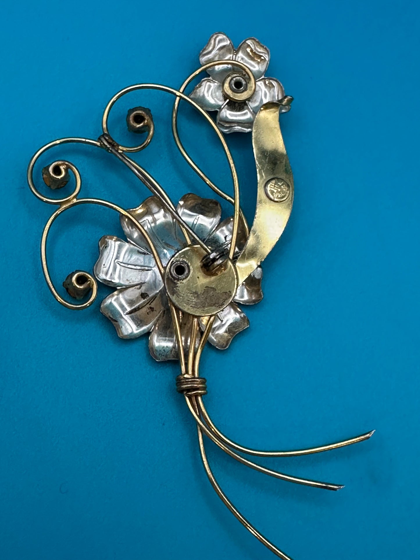 Harry Iskin vintage flower brooch with green crystals