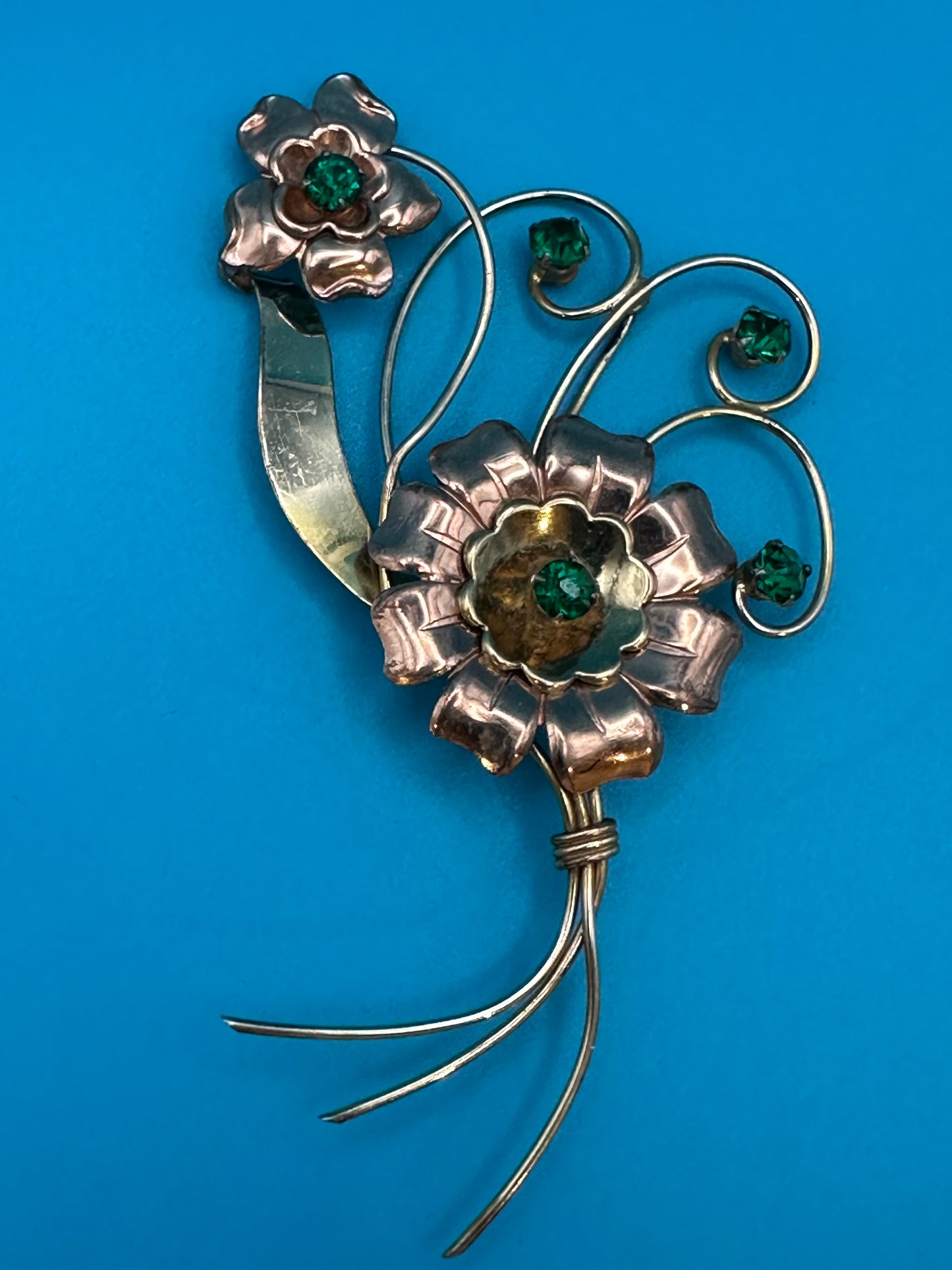 Harry Iskin vintage flower brooch with green crystals