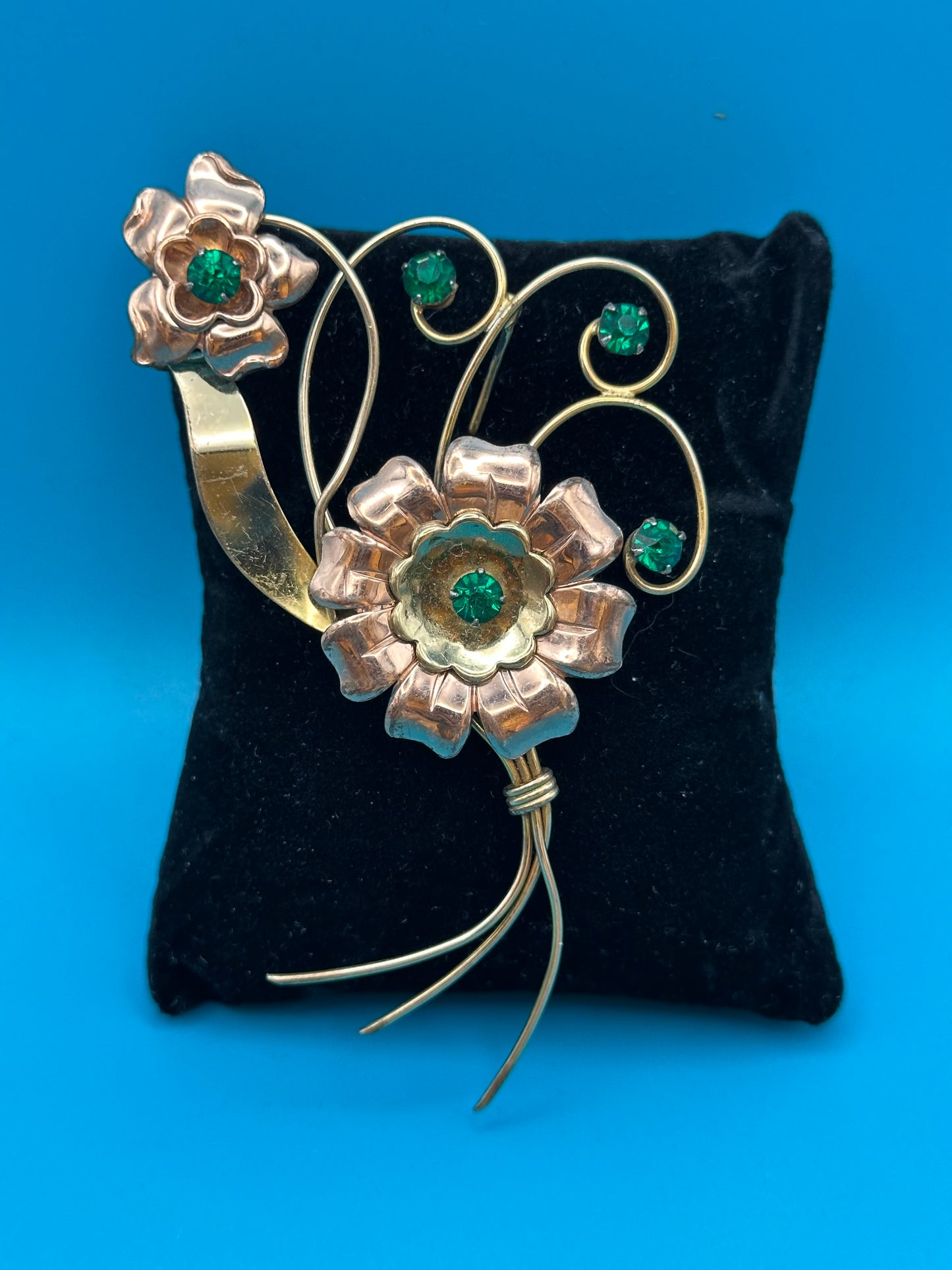 Harry Iskin vintage flower brooch with green crystals