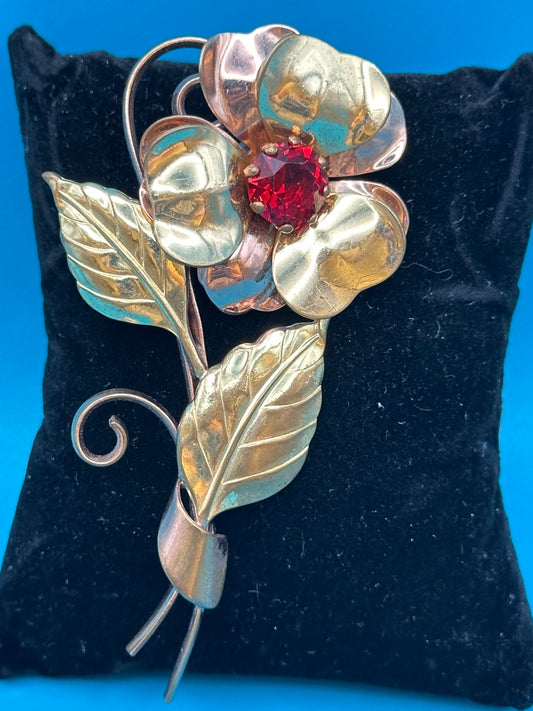 Vintage 1930's-1950's flower brooch with red crystal stone