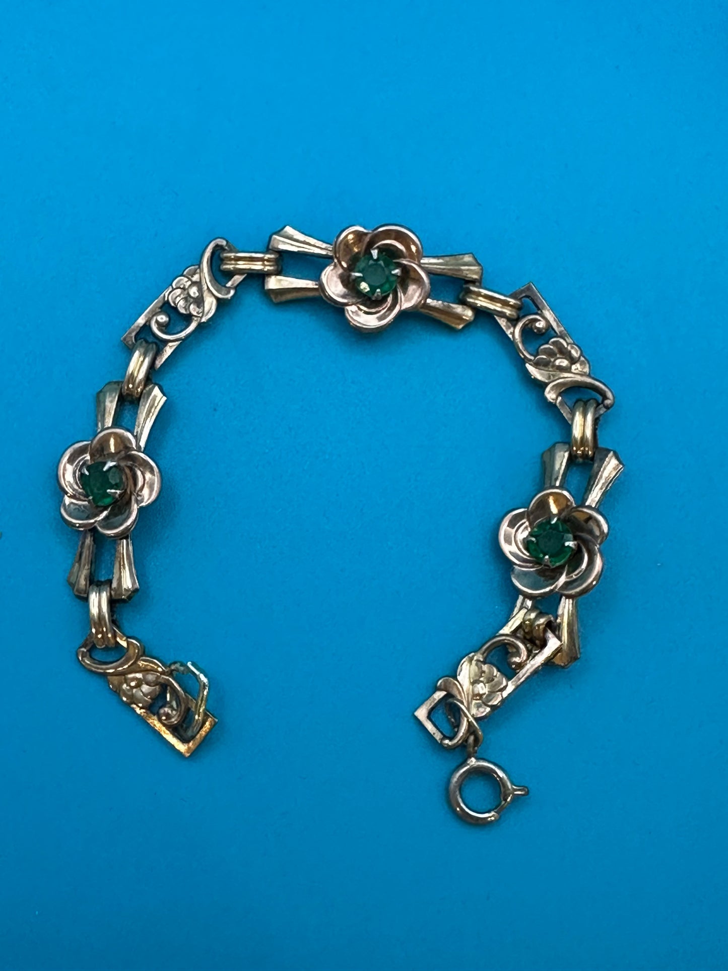 Vintage Harry Iskin green stone flower brooch, earrings, and bracelet set